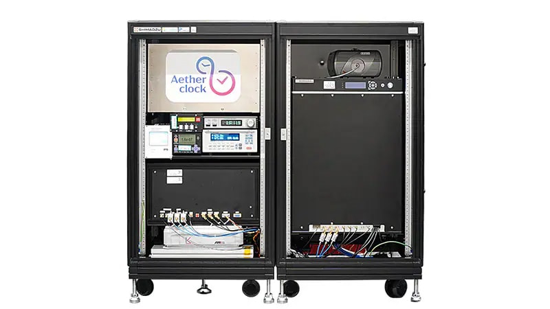 The Aetherclock OC020 strontium optical lattice clock, downsized compared to the experimental unit, enables measurements outside of a laboratory. Its functionality for automatically restoring operability can significantly reduce previous labor-intensive processes involved in restoring operations.