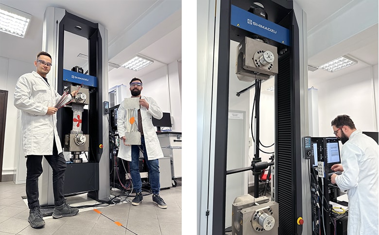 A Shimadzu AGX-V series universal testing machine in SHM System’s laboratory. Left: Dr. Tomasz Howiacki. 