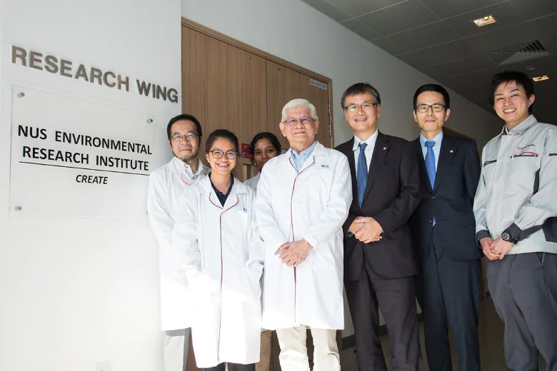 Shin Fujita (far left) and Choon Nam Ong (fourth from left) with other members of ShimadzuCorporation at the NUS Environmental Research Institute.