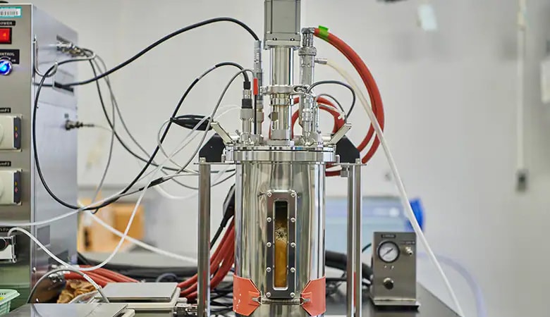 A microorganism culture apparatus on a laboratory table in the Bio-monomer Production Lab. located on the RIKEN Yokohama Campus