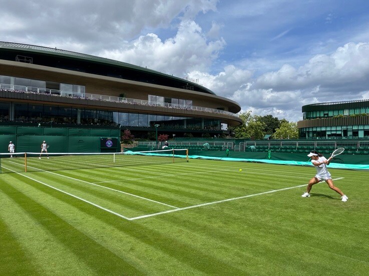 Practicing at the site of last year’s Wimbledon main draw