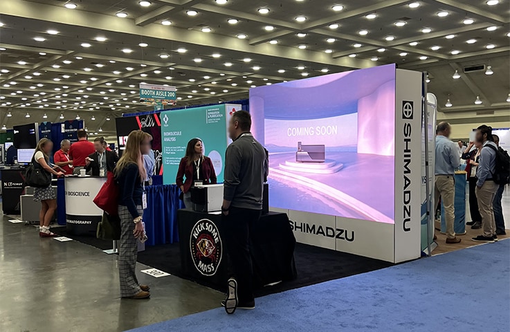 SSI Members assist at the Shimadzu Booth