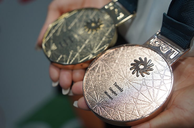 Singles bronze medal and doubles gold medal