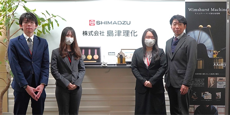 Project members of the Physics Exam Lab: Physics Exam Lab Series. From left: Ueno, Iwata, Kawasaki, and Matsumoto of Shimadzu Rika Corporation
