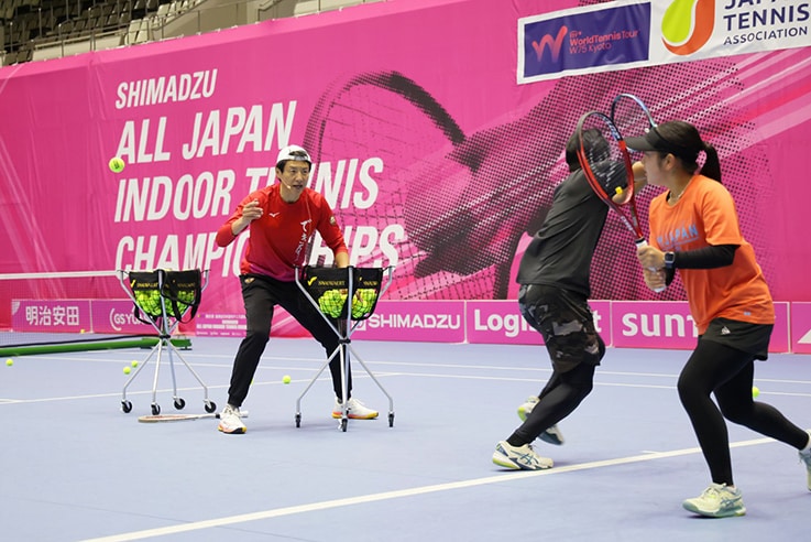 A tennis clinic with former professional tennis player Shuzo Matsuoka as the coach