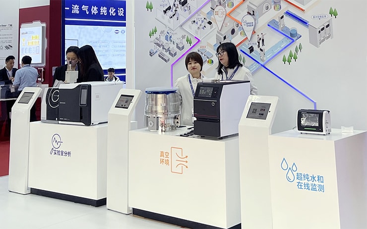 GCMS-QP2020 NX (left), TMP-2814 (center left), MSE-2600 series (center right), and TOC-1000e S (right) on display at the Shimadzu booth