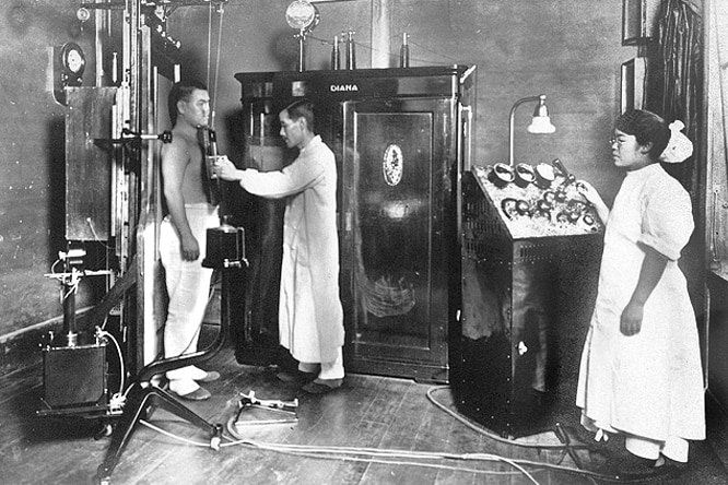 Examining a Patient Using an X-Ray System, Circa 1921